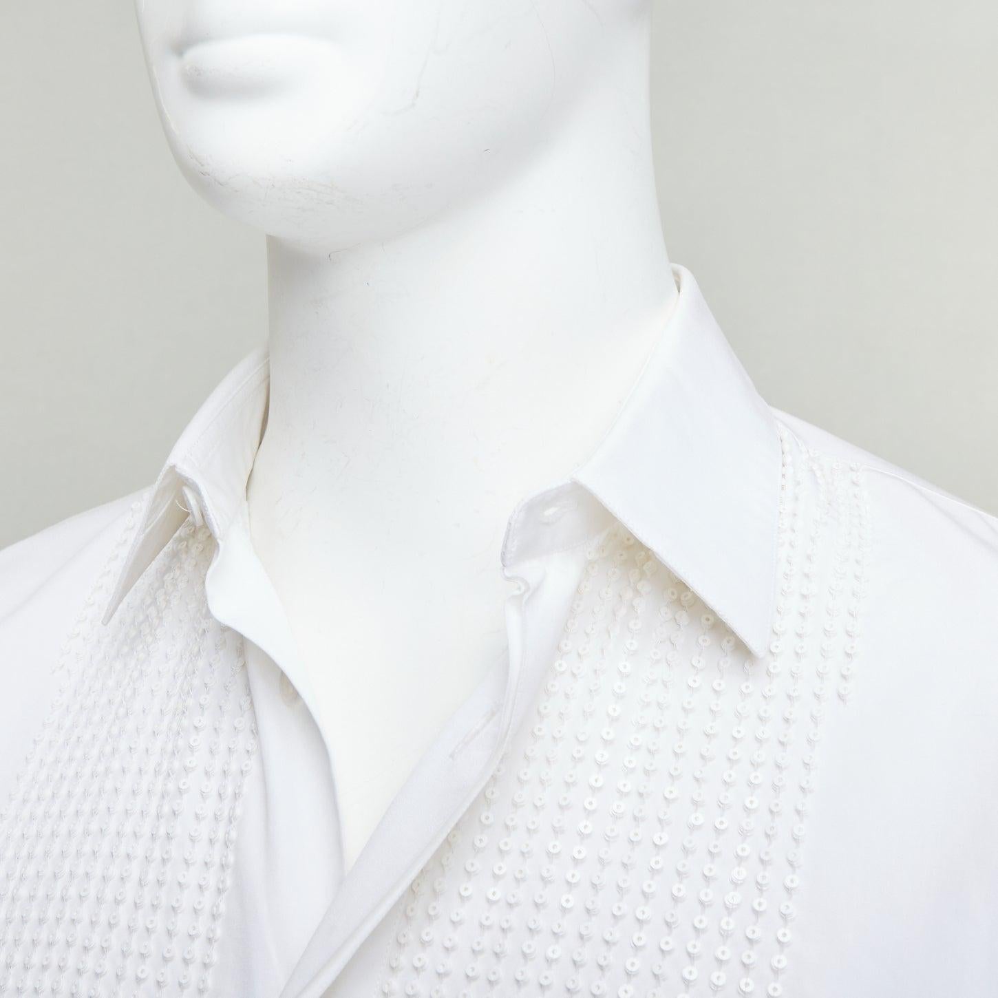 DIOR HOMME white cotton sequin applique front darted back shirt EU38 S
Reference: MECG/A00090
Brand: Dior
Collection: HOMME
Material: Cotton
Color: White
Pattern: Sequins
Closure: Button
Extra Details: Concealed button stand.
Made in:
