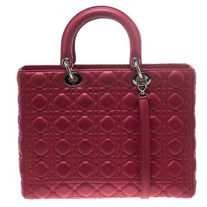 The Lady Dior tote from Dior is remarkable, highly coveted, and since its birth in 1994, it has swayed us with its shape, design, and beauty. This hot pink version is a joy to witness! It comes meticulously crafted from leather and designed with