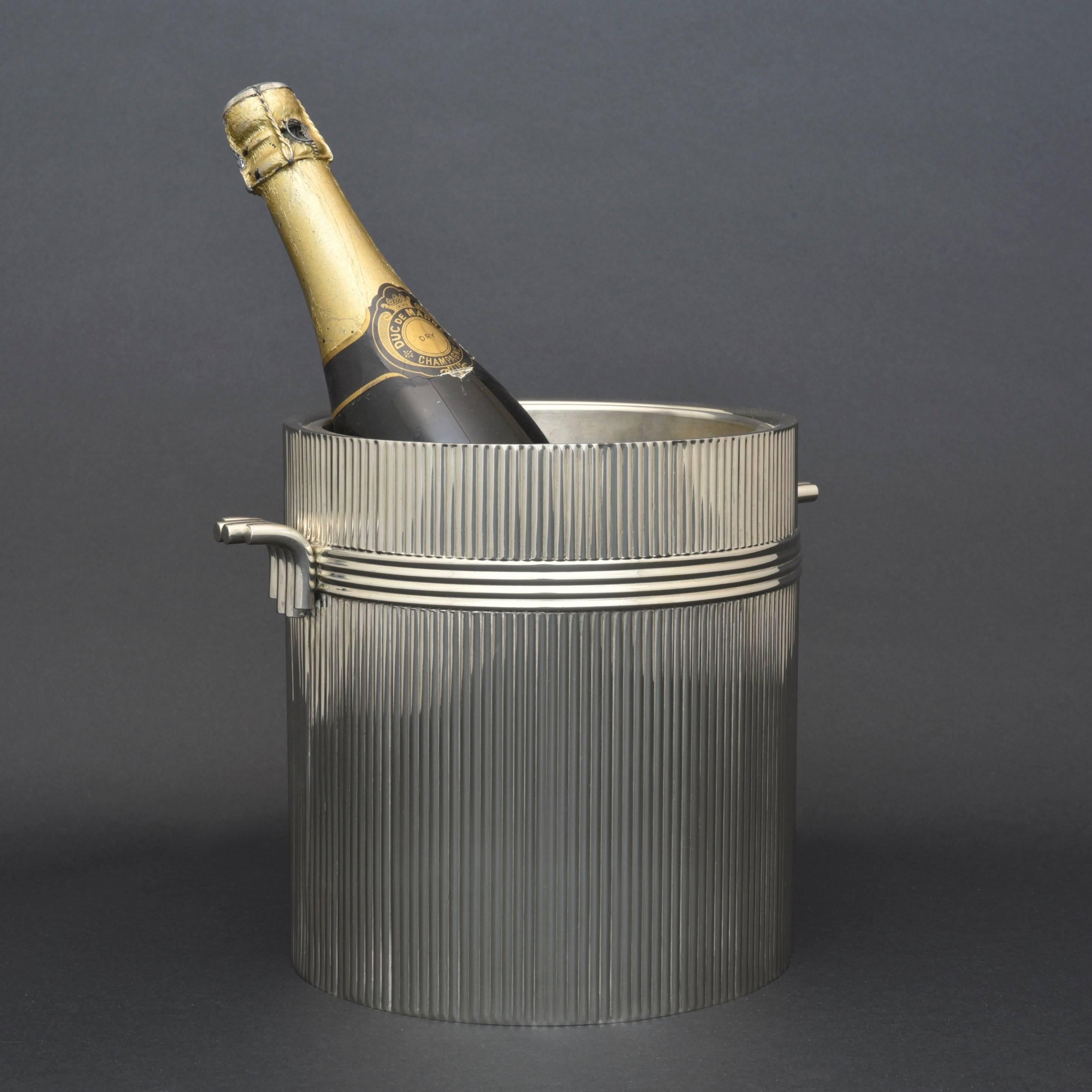 Stylish silver plated midcentury wine cooler by Christian Dior. Made to a fluted cylindrical design. Manufactured in France, in the 1970s and marked underneath, 'Christian Dior'.

Dimensions: 21 cm/8¼ inches (height) x 20 cm/8 inches (external