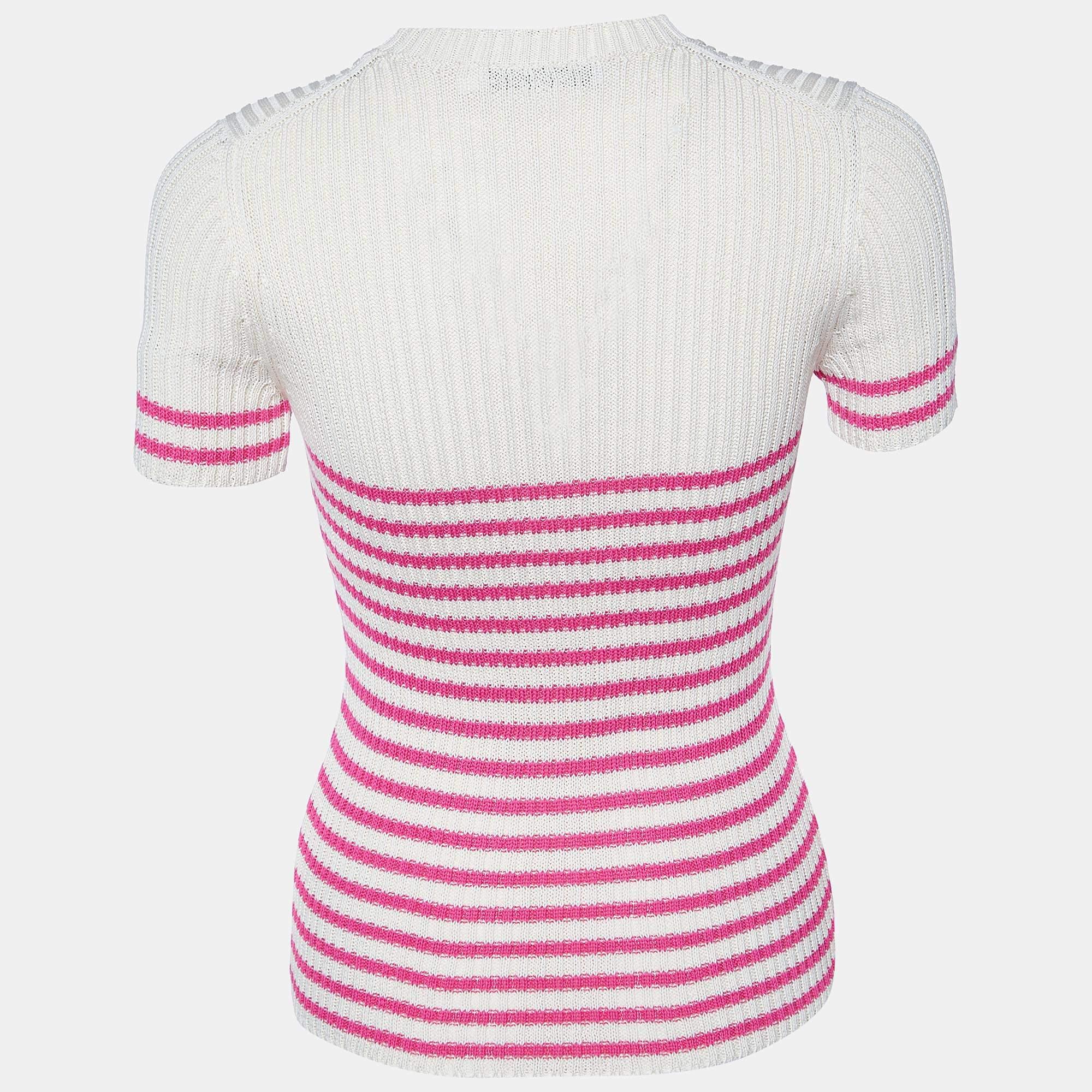 Wrap yourself in luxury with the Dior jumper. Crafted with precision and style, this jumper exudes elegance with its iconic Dior logo stripes. Soft cotton knit ensures comfort while making a bold fashion statement. Elevate your wardrobe with this