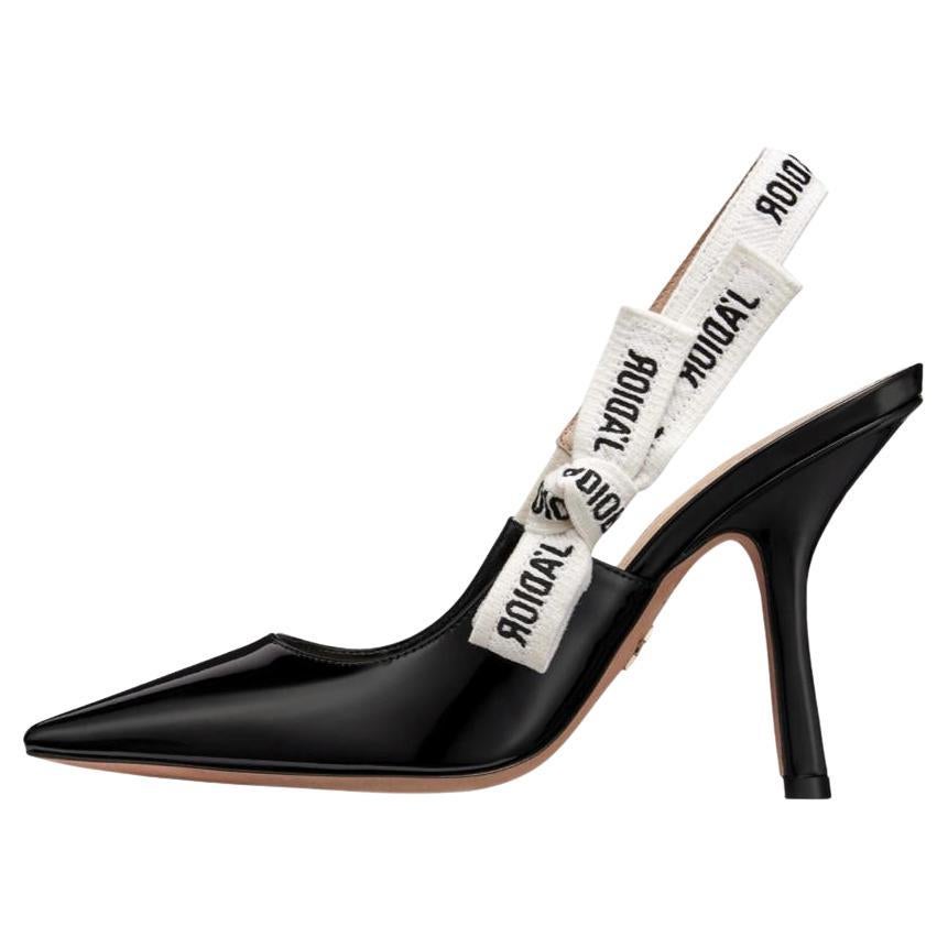 Dior J
Adior Patent Leather Slingback Pumps