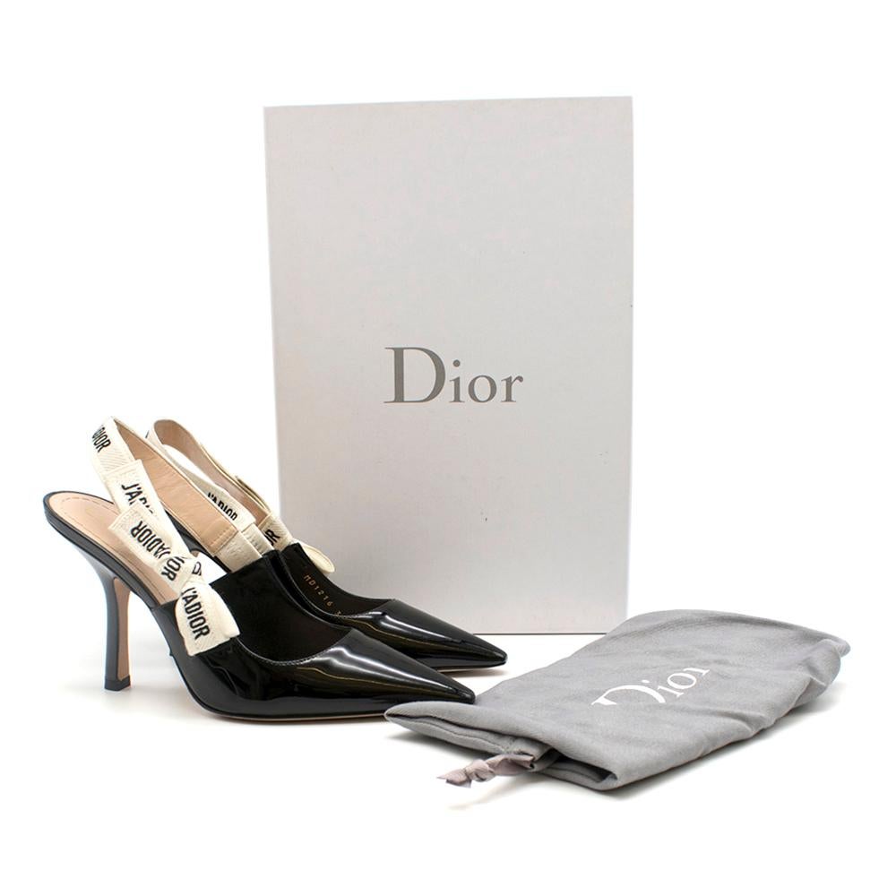 Dior J'Adior Slingback Pumps

Pointed toe
Patent finish
White, printed, leather-lined slingback on heel
Elastic on inside of slingback

Please note, these items are pre-owned and may show signs of being stored even when unworn and unused. This is