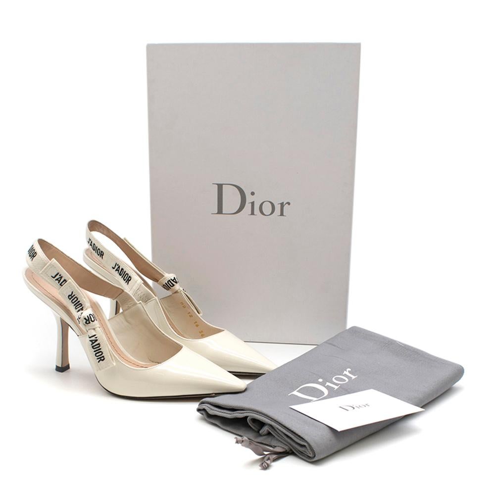 Dior J'Adior Slingback Pumps

White, printed, leather-lined slingback
Pointed toe
Patent finish
Slanted, centered heel

Please note, these items are pre-owned and may show signs of being stored even when unworn and unused. This is reflected within