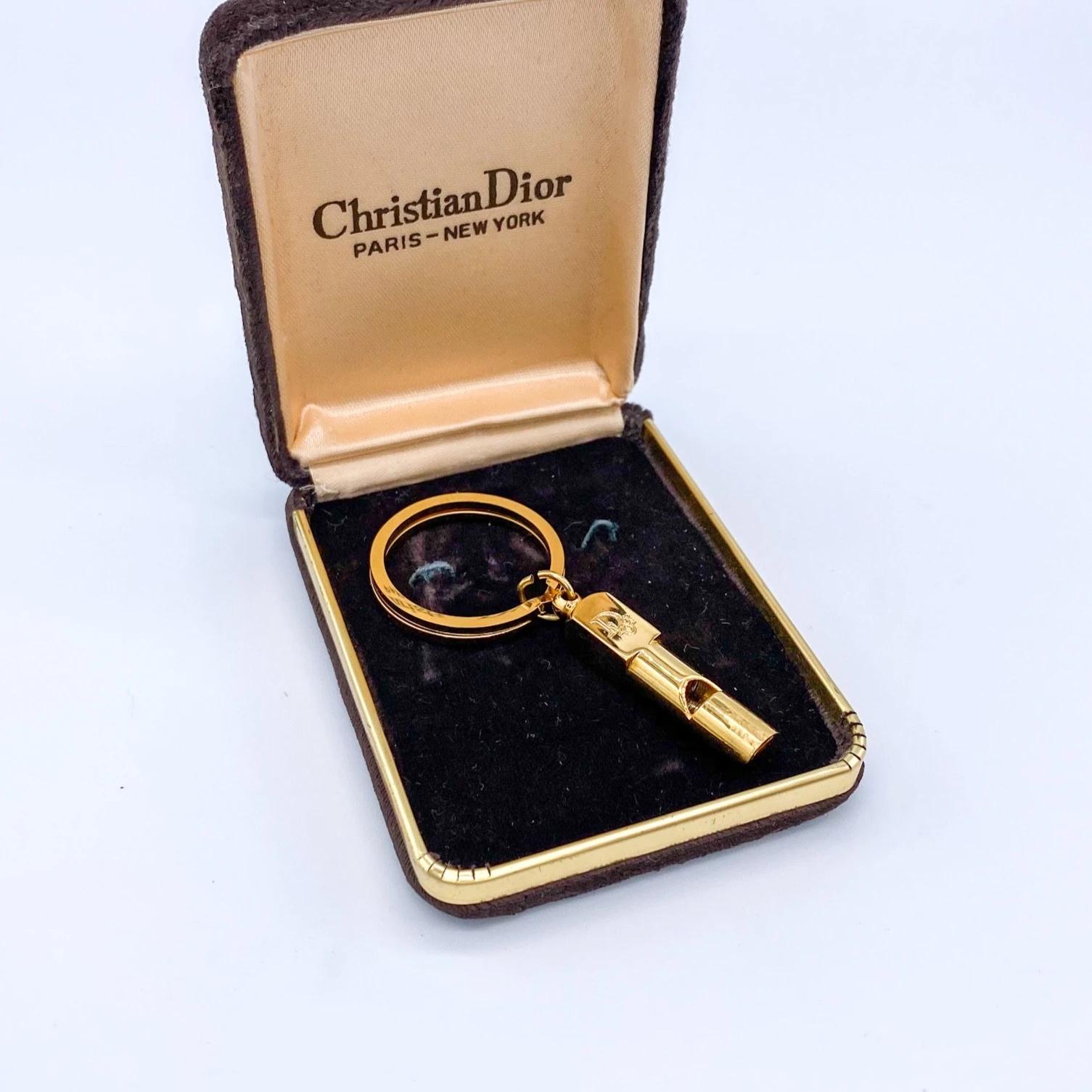 Christian Dior 1970s Vintage Whistle Keyring

A fantastic collectable piece from the 70s archive of Dior, still one of the most desirable fashion labels today.

Detail
-Cast from gold plated metal
-Whistle shaped pendant 
-Can be used as a keychain