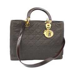 Dior Lady Dior handbag in brown canvas and leather finishes, with shoulder strap