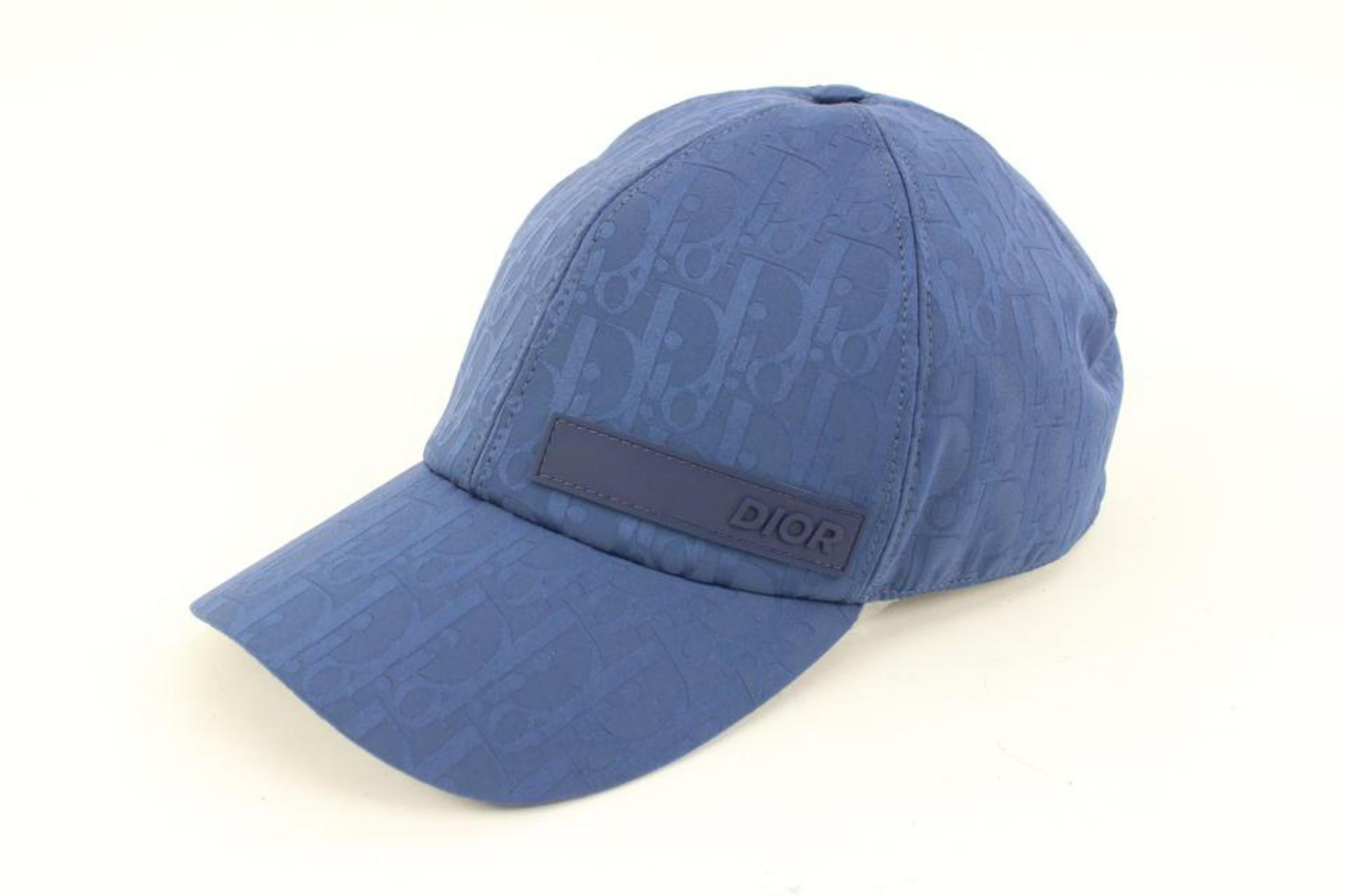 Dior Large Navy Oblique Trotter Casquette Baseball Cap Hat 3D419S
Date Code/Serial Number: 023C909I5545
Made In: Italy
Measurements: Length:  8.5