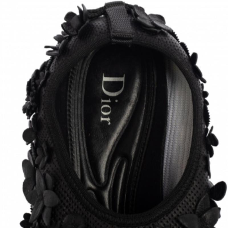 The words 'edgy' and 'ultra-modern' can be readily attributed to this pair from Dior. The sneakers were first introduced as a part of their Haute Couture Spring / Summer 2014 collection. Crafted from leather, they feature embellishments and rubber