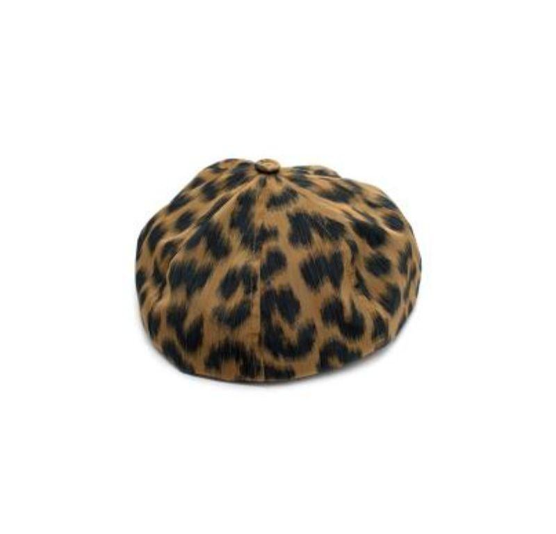 Dior Leopard Print Hat

-Fully lined 
-Leopard print body 
-Round shape 

Material: 

Cotton

Made in Italy 

PLEASE NOTE, THESE ITEMS ARE PRE-OWNED AND MAY SHOW SIGNS OF BEING STORED EVEN WHEN UNWORN AND UNUSED. THIS IS REFLECTED WITHIN THE