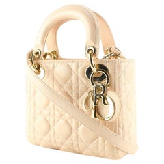 Dior - Mini sac cannage rose clair Lady Dior en cuir d'agneau matelassé 1D0201