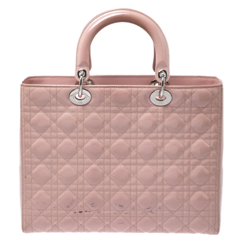 The Lady Dior tote is a Dior creation that has gained recognition worldwide and is today a coveted bag that every fashionista craves to possess. This pink tote has been crafted from patent leather and it carries the signature Cannage quilt. It is