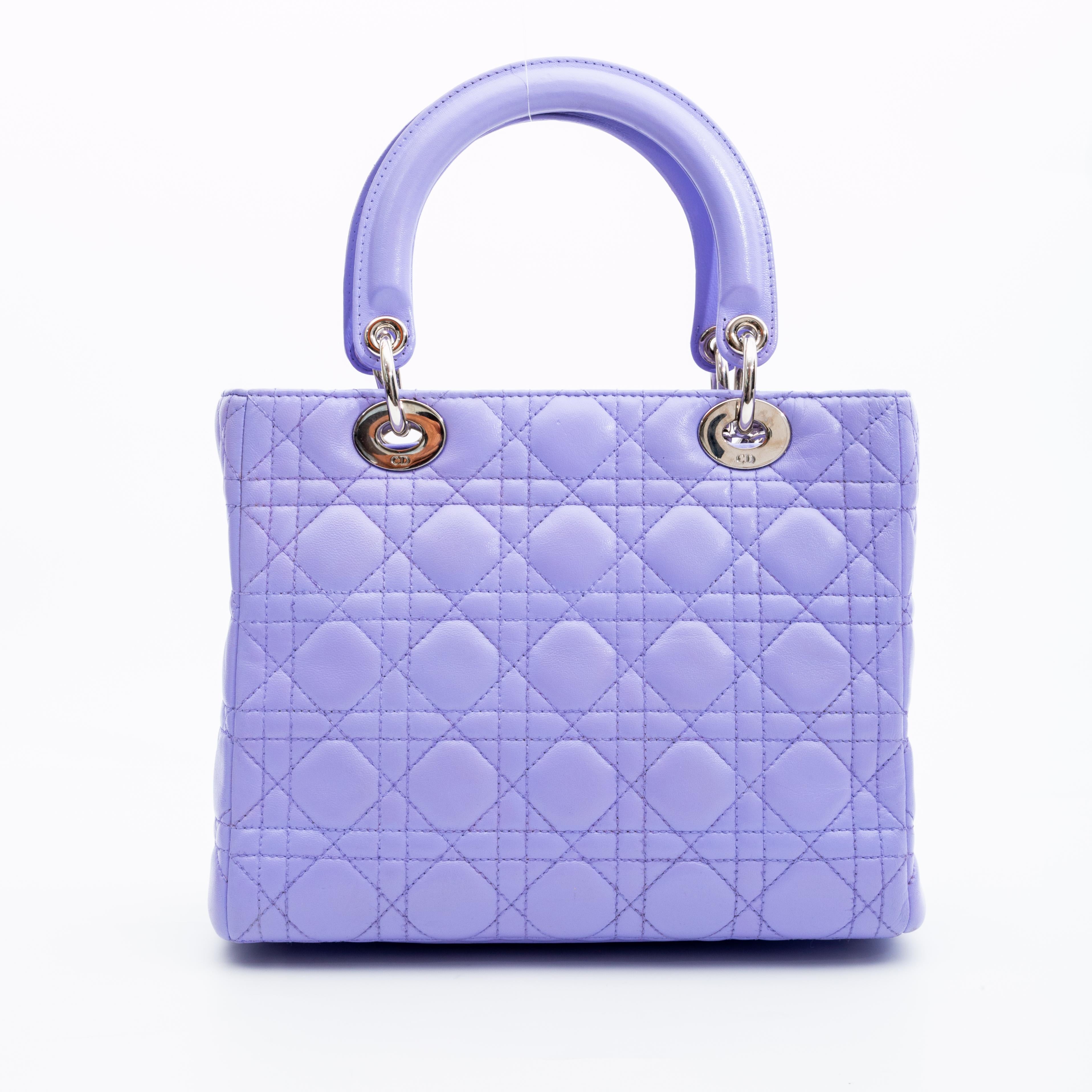 Only 60 bags made. Japanese exclusive.

COLOR: Lilac (light purple)
MATERIAL: Leather
ITEM CODE: 02-MA-0095
MEASURES: H 8” x L 9.5” x D 5”
DROP: 4” (top handles)
DROP: 16” (strap)
COMES WITH: 3rd party Authentication 
CONDITION: Good - faint