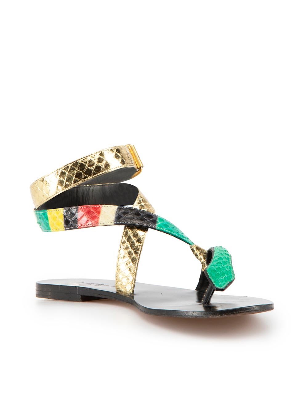 CONDITION is Very good. Minimal wear to sandals is evident. Minimal wear to insole and sole of both shoes where indents and scratches are visible on this used Christian Dior designer resale item.

Details
Limited edition
Multicolour
Snakeskin
Thong