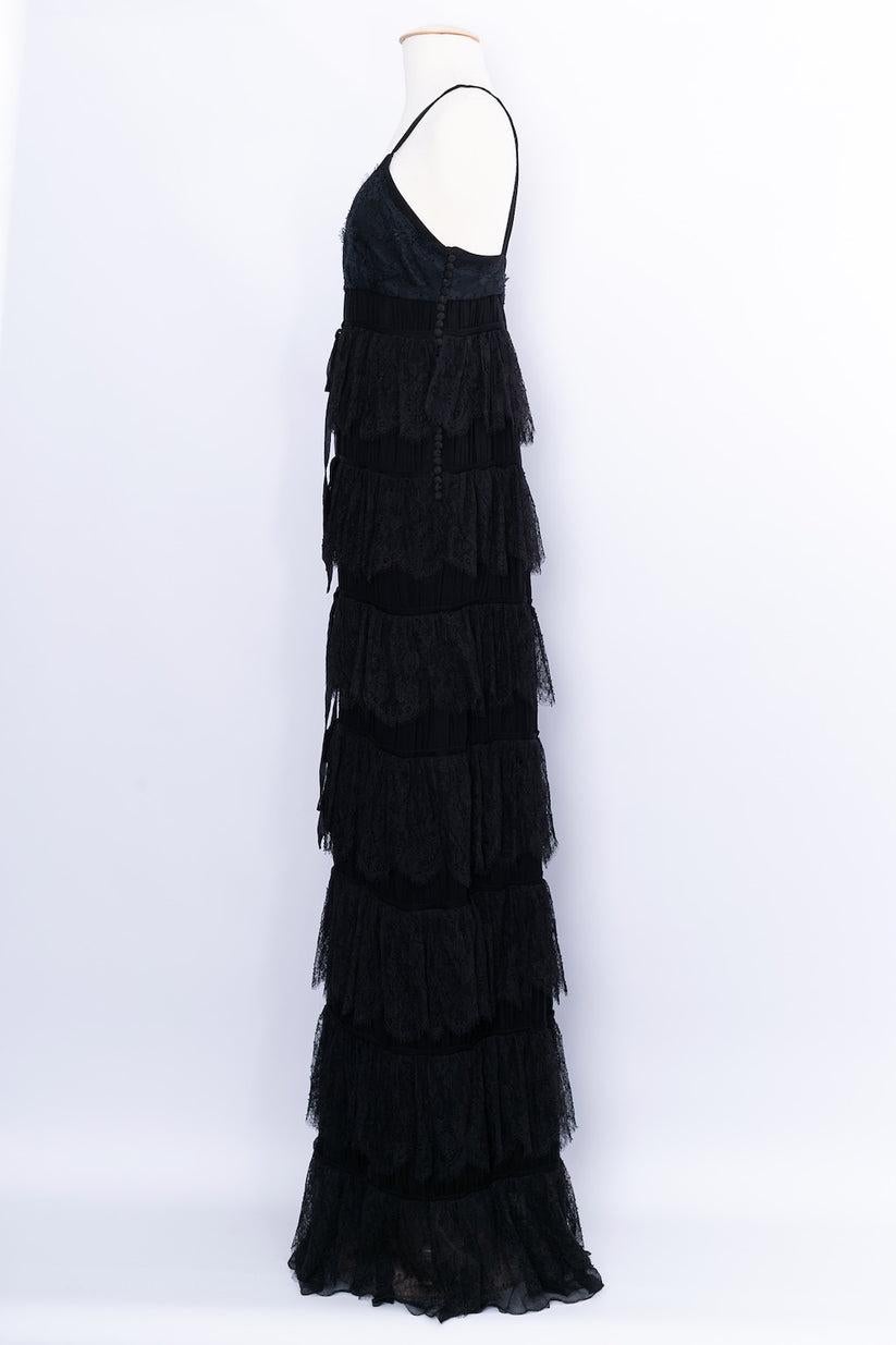 Dior - Long dress in silk and lace manufactured under John Galliano's artistic direction. No composition or size tag, it fits a size 36FR.
Cruise Collection, 2011

Additional information: 
Dimensions: 
Bust: 39 cm (15.35