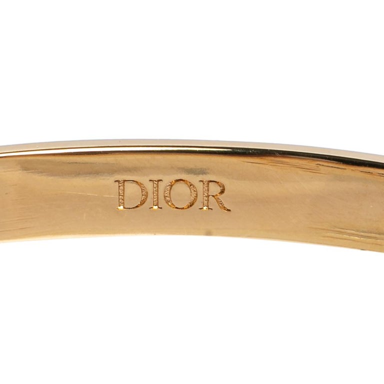 Dior Lucky Locket Gold Tone Cuff Bracelet at 1stDibs