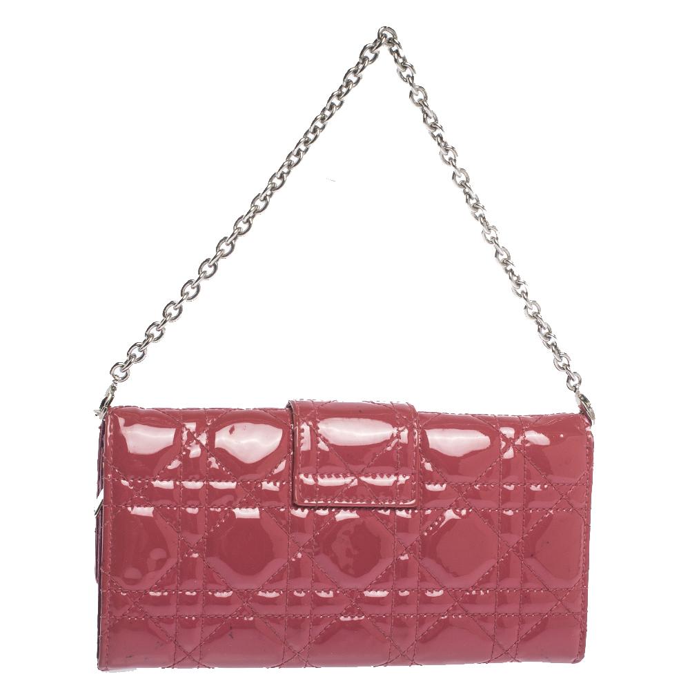 This Dior wallet was named after 'New Look' which was actually coined by Christian Dior himself. Dazzling in a gorgeous pink shade, the bag is crafted from leather in their Cannage pattern and designed with a single chain handle and a front lock.