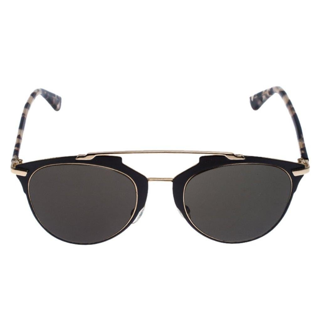 From their Dior Reflected collection, these aviator sunglasses by Christian Dior are the perfect style accessory for all your outdoor plans. They come in an acetate and gold-tone metal body with protective lenses and the signature CD logo on the