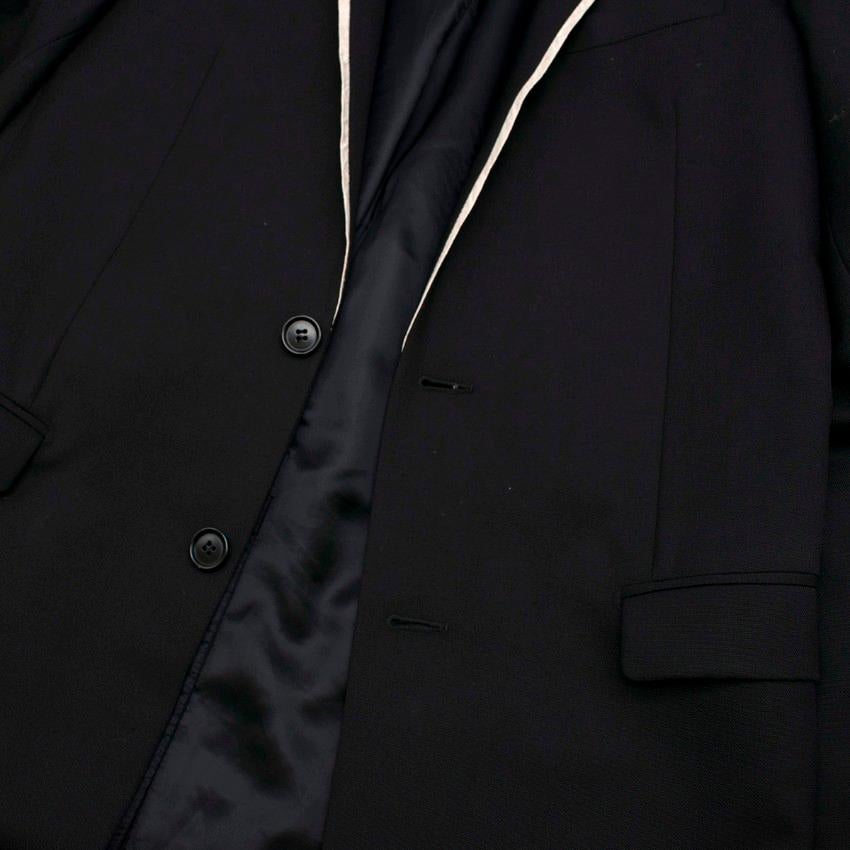 white blazer with black trim