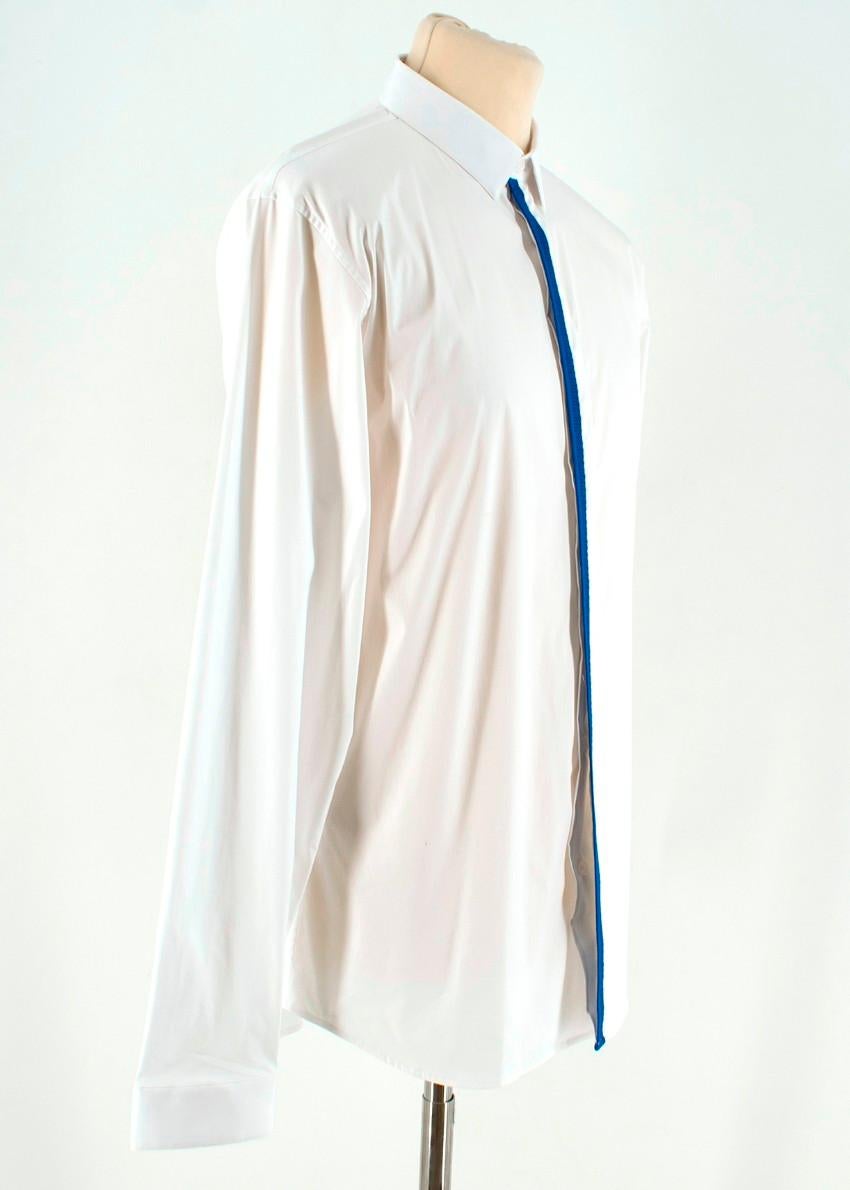 Dior Men's White Cotton-blend Shirt

- White cotton-blend shirt
- Lightweight
- Centre-front button fastening
- Front blue mesh detailing
- Ruched buttoned cuffs
- Pointed collar

Please note, these items are pre-owned and may show some signs of
