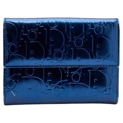 Portefeuille compact Dior en cuir verni bleu métallisé