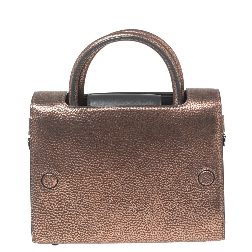 Every stitch and detail on this Diorever bag gives high praise to quality craftsmanship and validates the painstaking effort that goes into making a handbag art as fine as this. Structured to perfection using the finest leather and designed with a