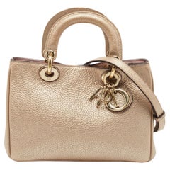 Dior Sac cabas Mini Diorissimo en cuir doré métallisé