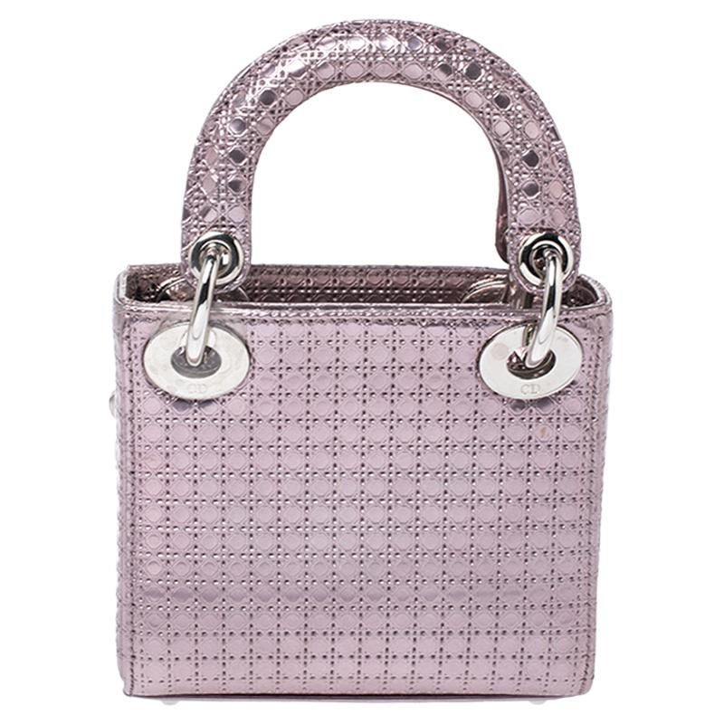 The Lady Dior tote is a Dior creation that has gained recognition worldwide and is today a coveted bag that every fashionista craves to possess. This micro-sized purple tote has been crafted from leather and it carries the signature Cannage quilt