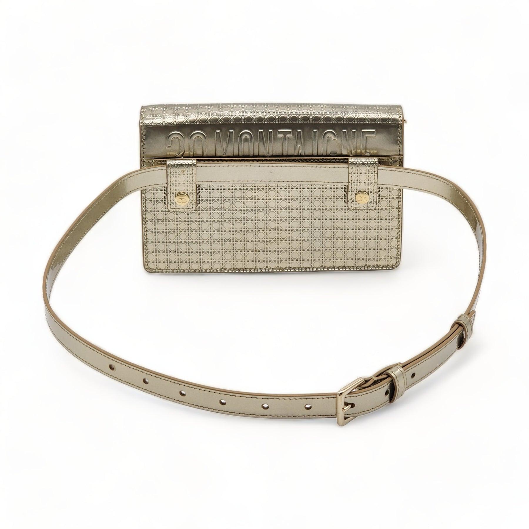 Features an adjustable belt strap, optional chain link strap, and polished gold hardware. The flap opens to a black suede interior with pockets and four card slots.

Additional information:
Material: Leather
Micro cannage monogrammed
Color: