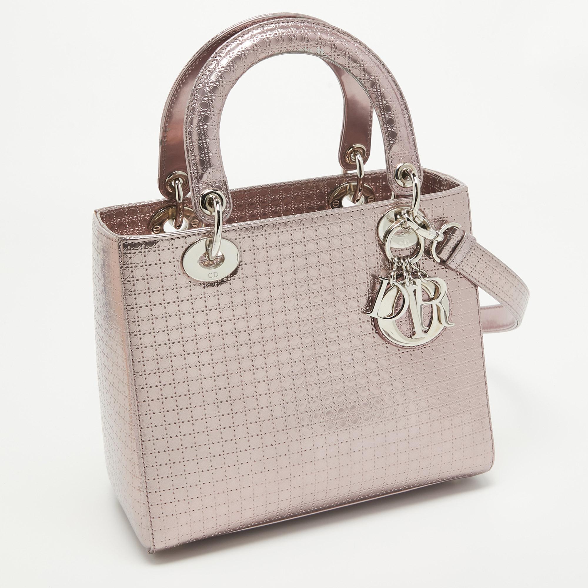 Due to detailed and innovative designs, Dior has managed to be at the top of fashion's hierarchy through the years. Infuse the signature aesthetics of the brand into your outfit by accessorizing it with this Lady Dior tote. With a classic design, it
