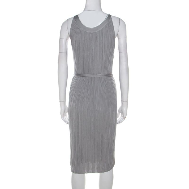 What a delighting sight this silver dress brings! Made from quality materials, this Dior dress flaunts a sleeveless style and a belted waistline. It'll look perfect with strappy sandals.

Includes: The Luxury Closet Packaging

