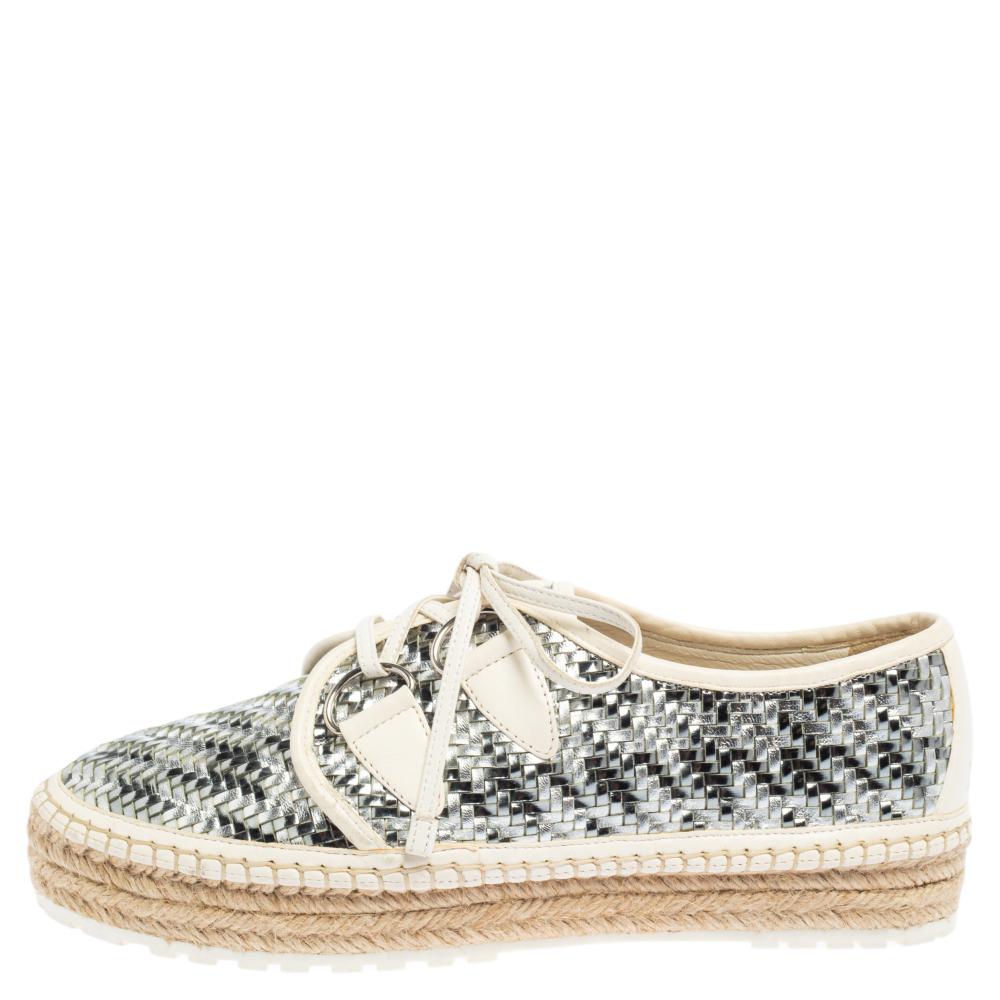 Nail your casual looks every time you step out in these sneakers from Dior. They've been crafted from woven leather and styled with smooth white trims, laces on the vamps, and espadrille detailing on the midsoles. They are well-built to offer you