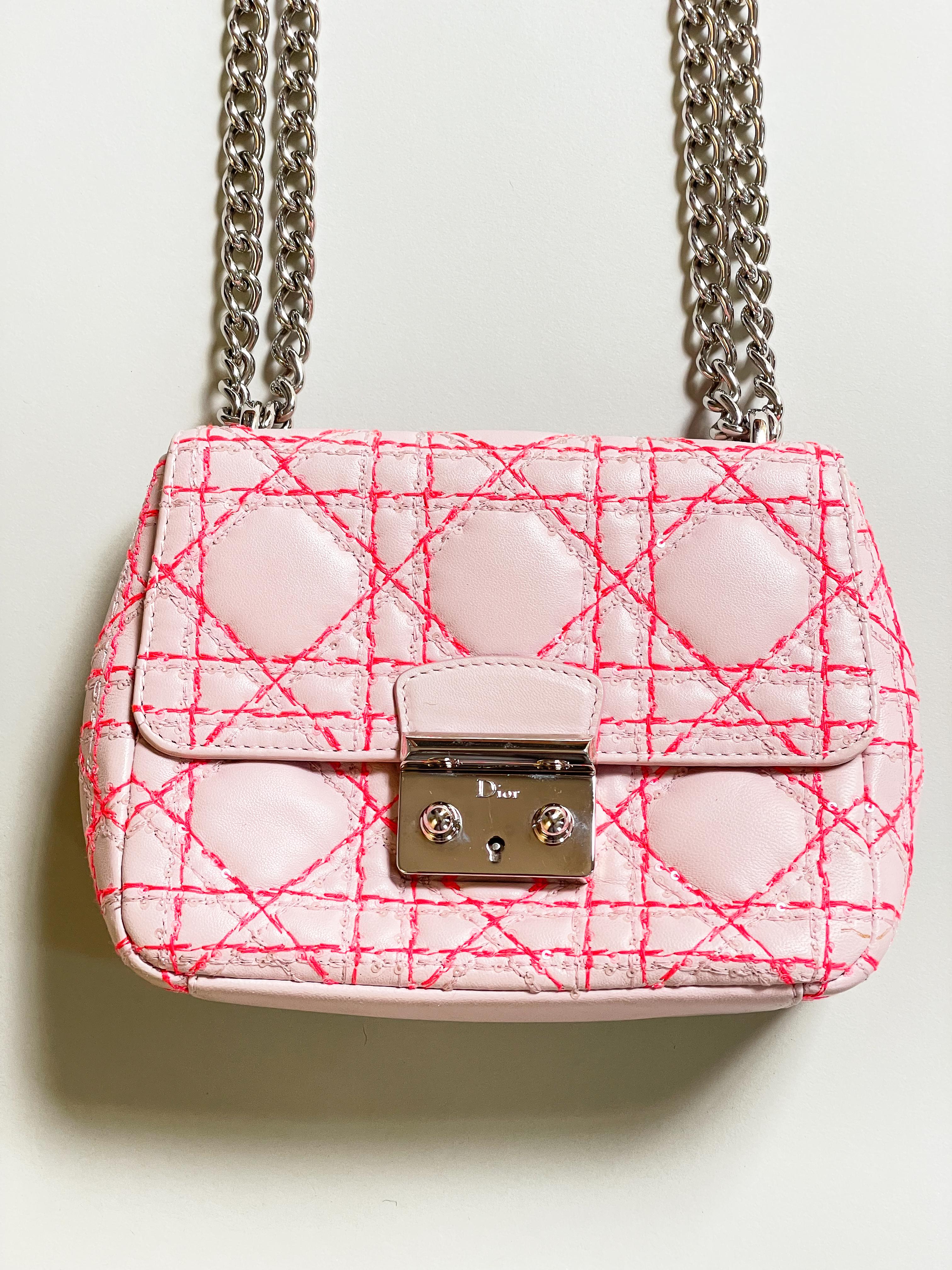 The perfect mini bag for an afternoon stroll. Almost perfect condition, sold with dust bag. A quilted pink fine leather embroidered with a few sequins. A shoulder bag but of course can be worn in hands. 

Year of manufacture: 2014