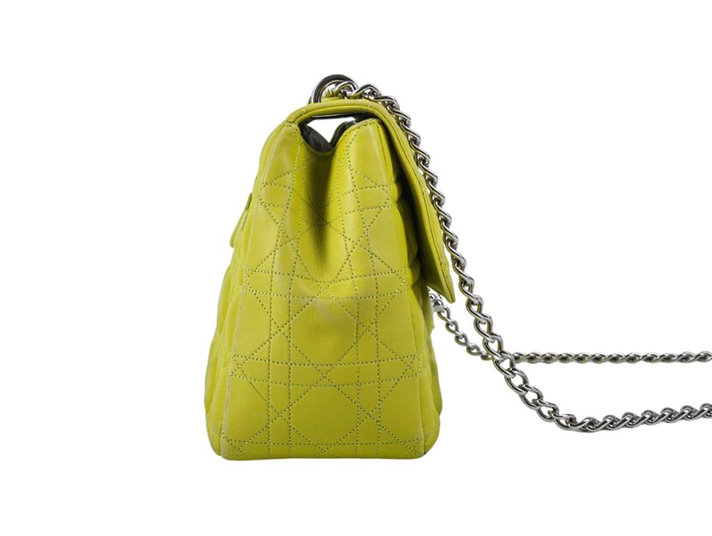 What a stunning bag by Dior this is - the Miss Dior Shoulder bag in Cannage leather. Made in a canary yellow colour with pale blue inside lining - just stunning. This bag has been lovingly used and has a few marks on the front and reverse of the bag