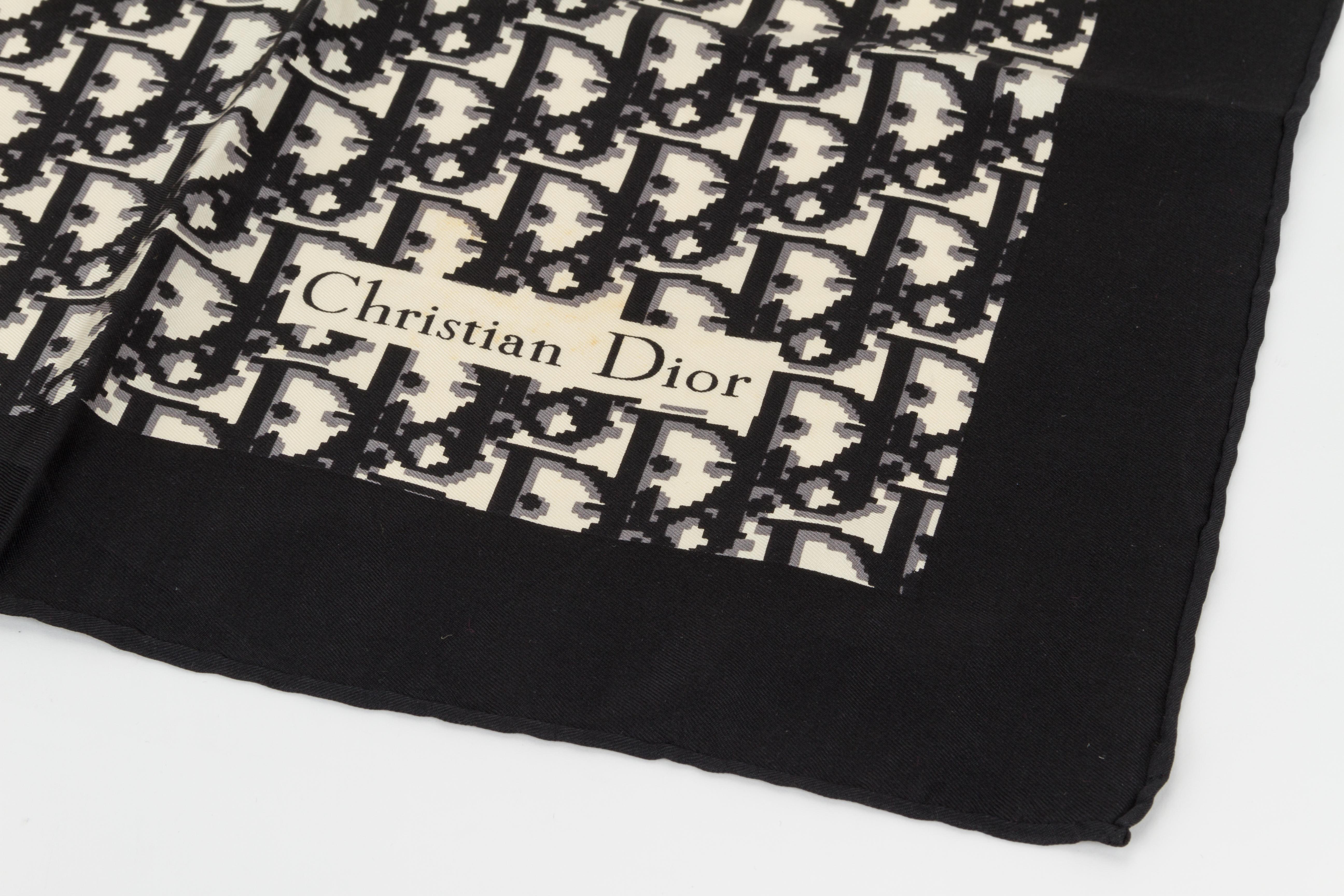 Dior signature monogram black and cream silk twill scarf. Hand rolled edges. Original care tag attached.