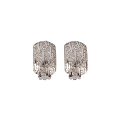 Orecchini a clip in metallo argentato con monogramma Dior