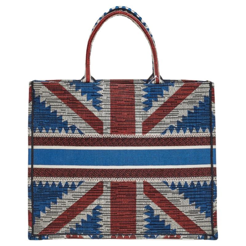 Designed by Maria Grazia Chiuri, the Dior Book Tote is a travel accessory for people with style. The bag here is crafted using canvas into a beautiful structure and carries a 'Union Jack' design all over. Two handles, the 'Christian Dior' signature,