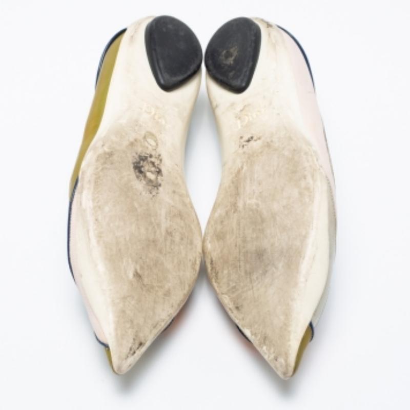 When comfort meets style, we get these well-designed ballet flats by Dior. Made in Italy from fabric and leather, they feature pointed toes, distinct hues, and comfortable insoles for all-day ease.