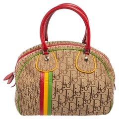 Dior - Sac Boston Rasta en toile et cuir en forme d'oblique multicolore