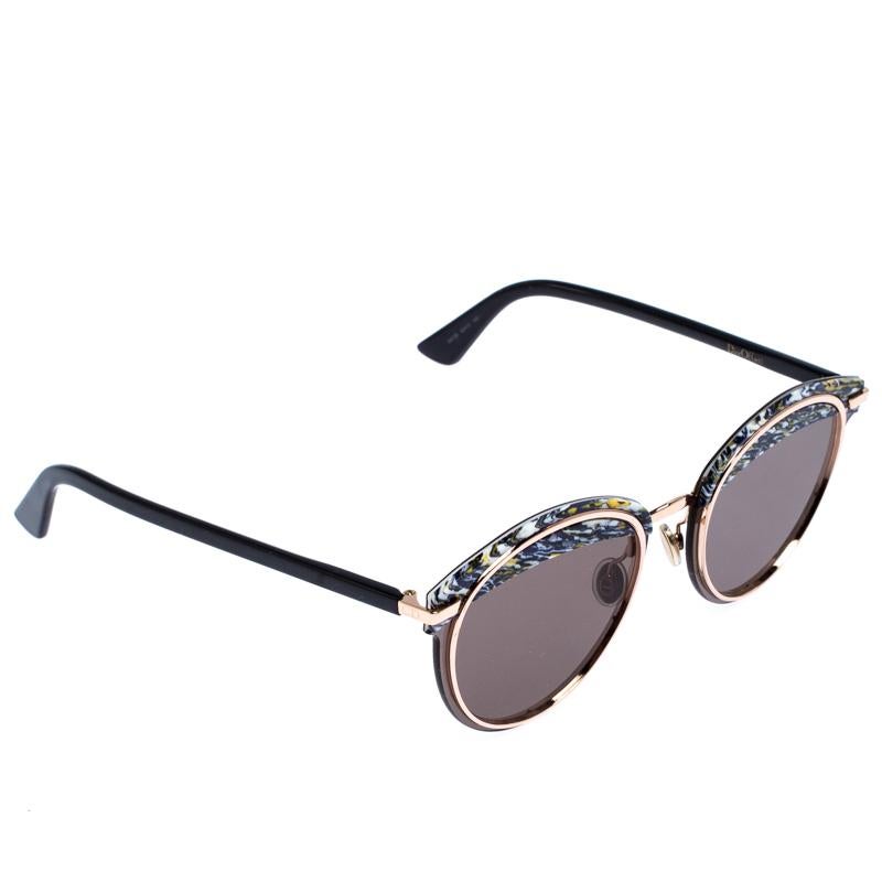 Don't limit your fashion sense to just your clothes and shoes but let your accessories also help you make the right style statement. Choose creations like these sunglasses from Dior to do just that for you. Flaunting cat-eye edges and lenses, this