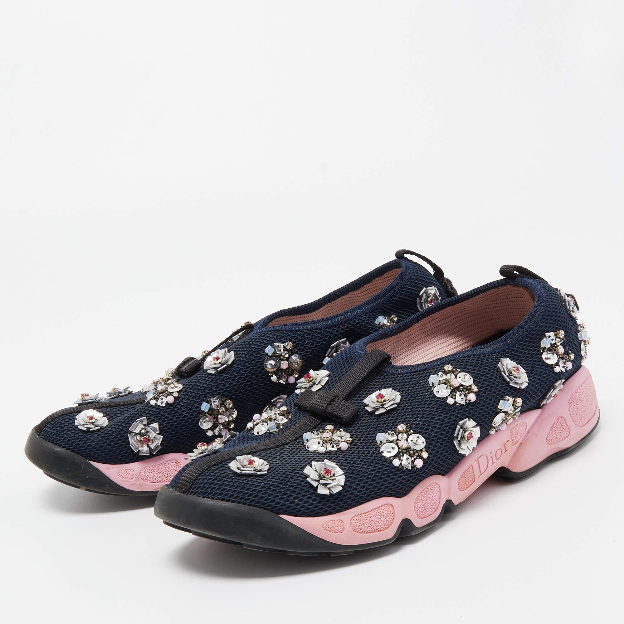 Coming in a classic silhouette, these designer sneakers are a seamless combination of luxury, comfort, and style. These sneakers are finished with signature details and comfortable insoles.
