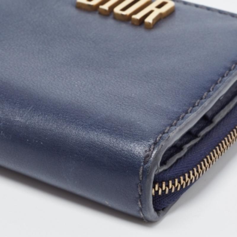 Cartera con cremallera Dior D Fence de piel azul marino en venta 1