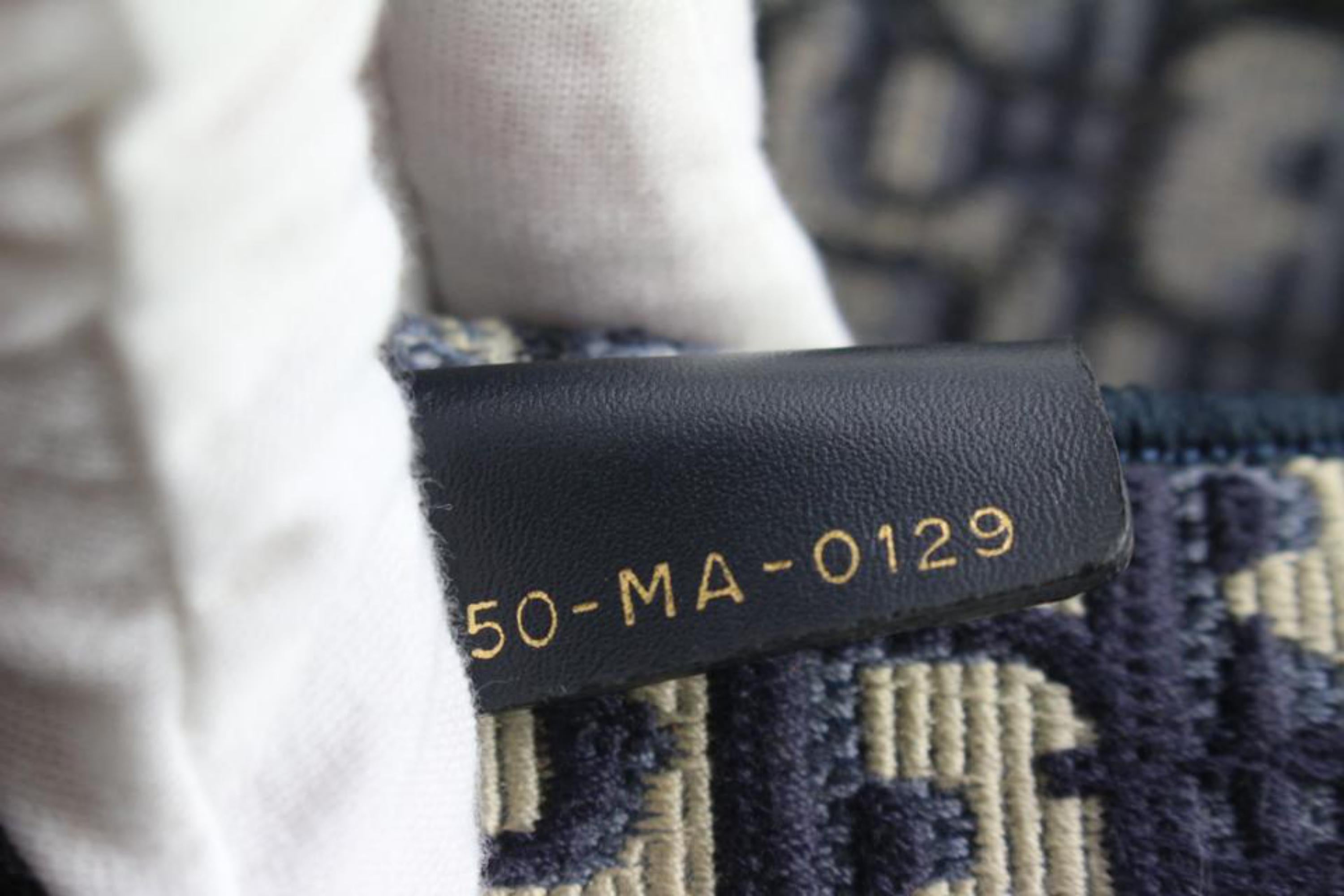 Dior Navy Monogram Trotter Oblique Small Book Tote Shopper Bag s27d6
Date Code/Serial Number: 50-MA-0129
Made In: Italy
Measurements: Length:  14