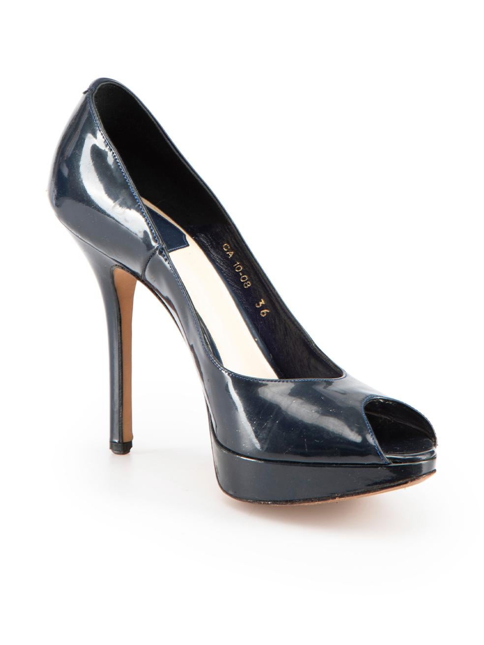 CONDITION is Good. General wear to heels is evident. Moderate signs of wear to overall leather with minor scuff marks and indentations over both heels on this used Dior designer resale item.
  
Details
Navy
Patent leather
Heels
Peep