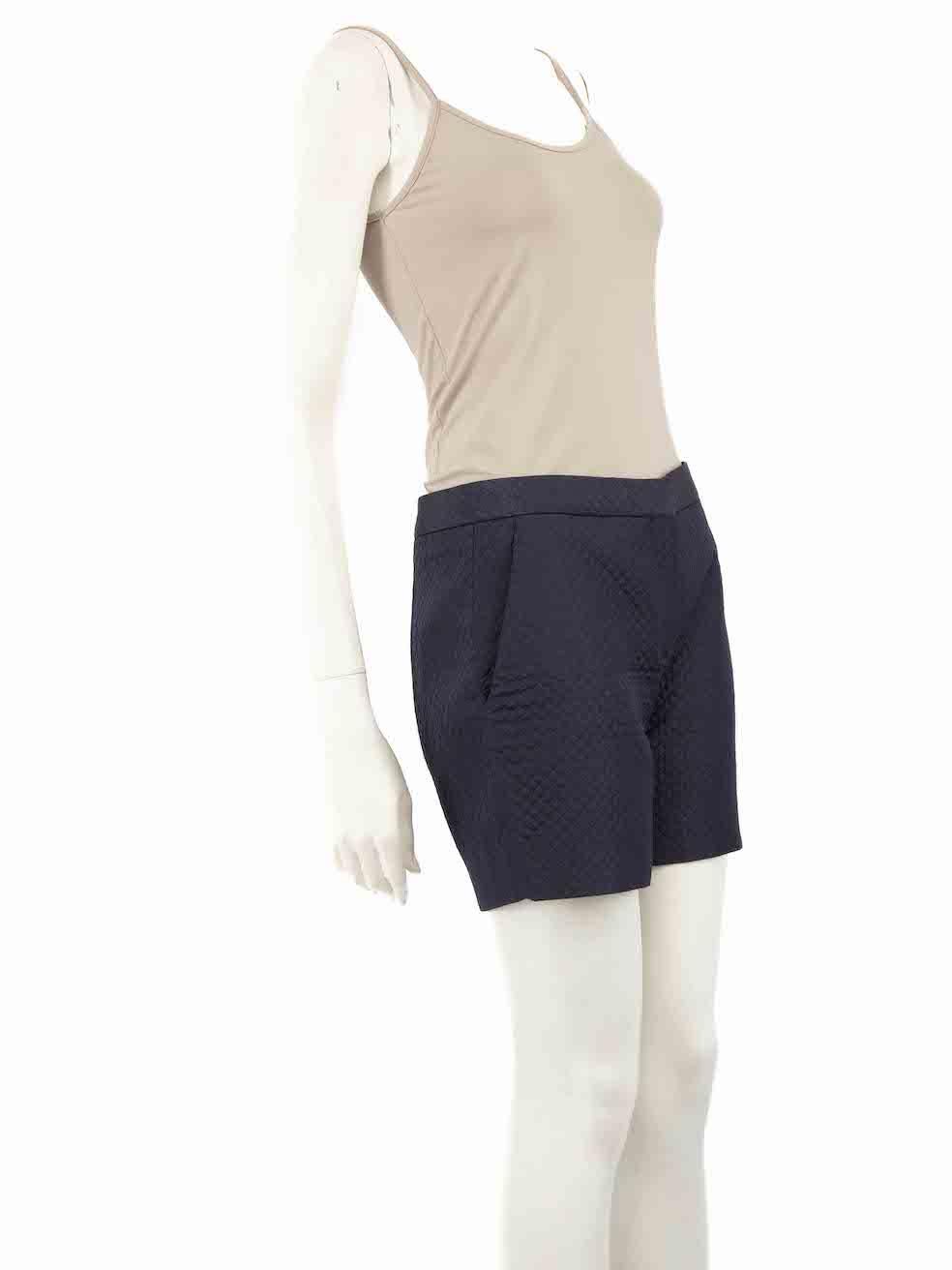 CONDITION is Very good. Hardly any visible wear to shorts is evident on this used Christian Dior designer resale item.
 
 
 
 Details
 
 
 Navy
 
 Silk
 
 Shorts
 
 Quilted accent
 
 Mid rise
 
 Front zip closure with clasp and button
 
 2x Front