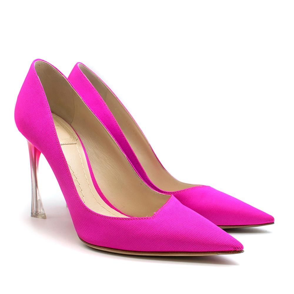 Dior Neon Pink Perpex Pumps

- Smooth, stitched pink fabric
- Pointed toe
- Angled cut near toe
- Plastic heel with red-clear gradient

Please note, these items are pre-owned and may show signs of being stored even when unworn and unused. This is