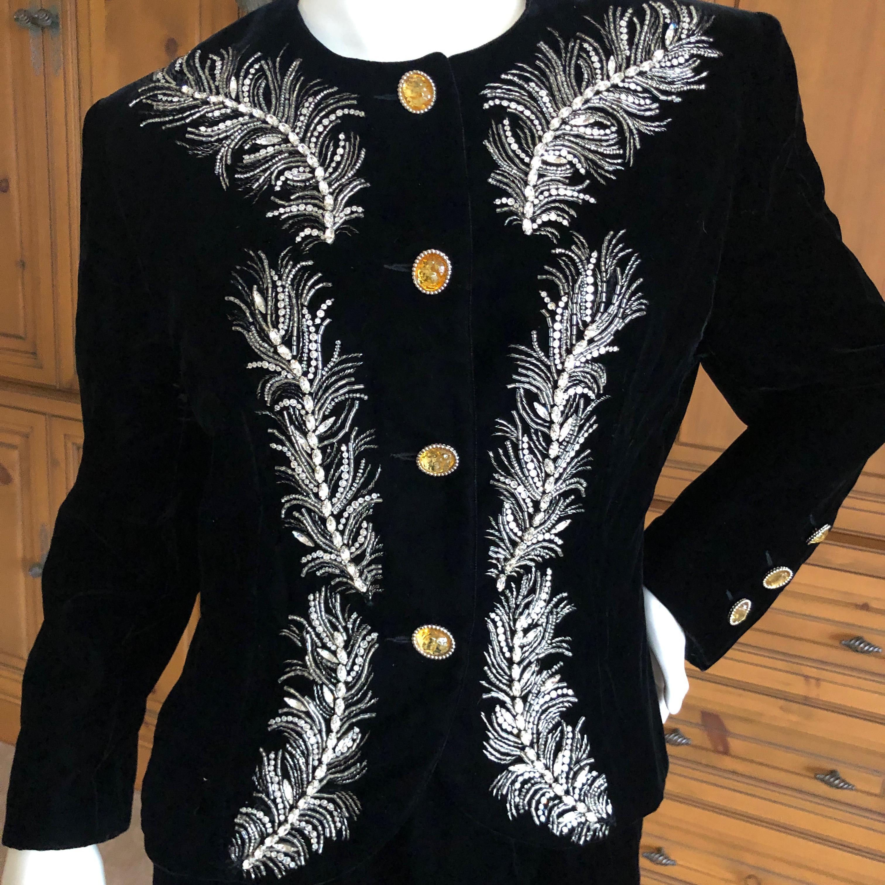 Exquisite black velvet evening ensemble with dramatic crystal and bead embellished plumes by Maison Lesage, by Gianfranco Ferre for Christian Dior.
Numbered on the label, the demi couture was between Haute Couture and Pret a Porter.
Decorated with