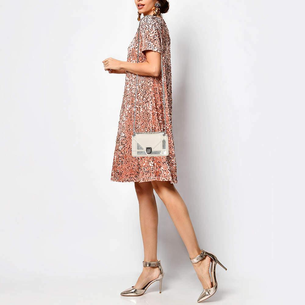 Designer bags are ideal companions for ample occasions Here we have a fashion meets functionality piece crafted with precision. It has been equipped with a well sized interior that can easily fit your small essentials.