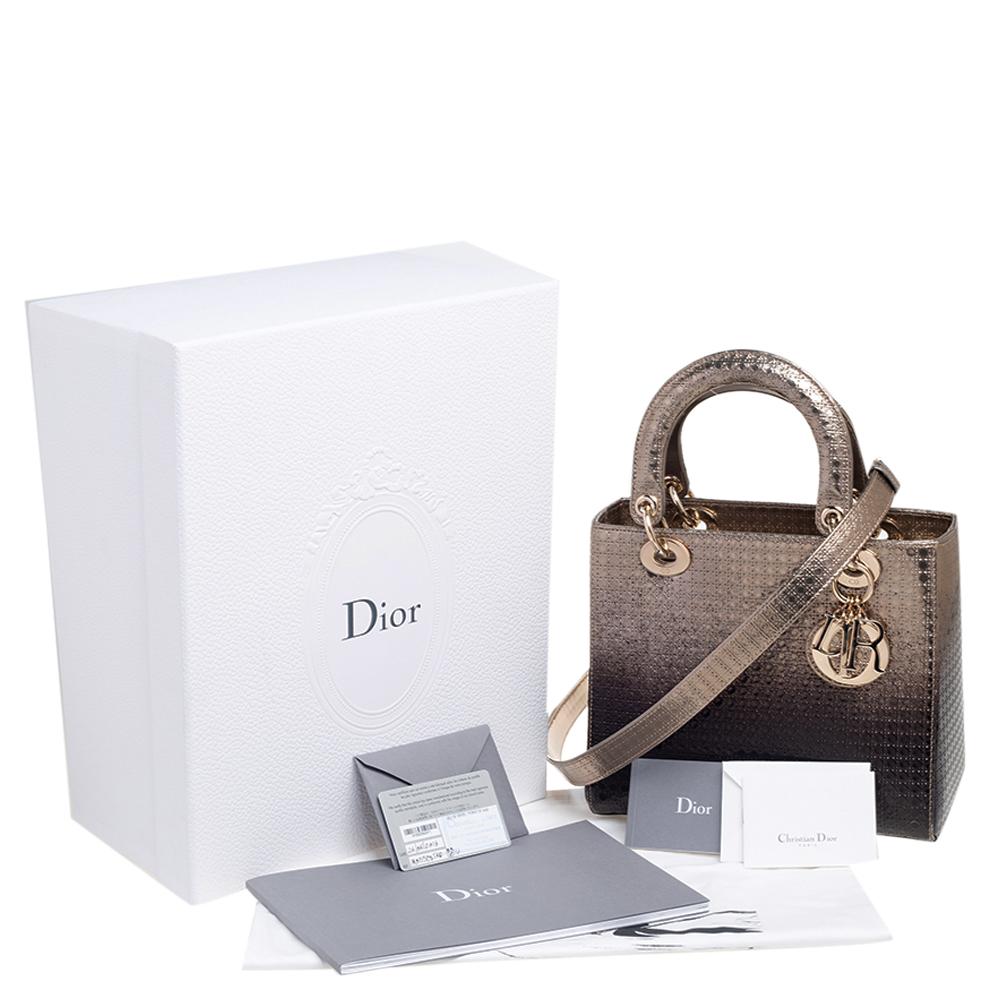Crafted as a tribute to the late Lady Diana, Princess of Wales, the Lady Dior tote continues to fascinate people with its iconic legacy and eternal style. Made with ombre metallic gold micro-cannage leather on the exterior and flaunting the