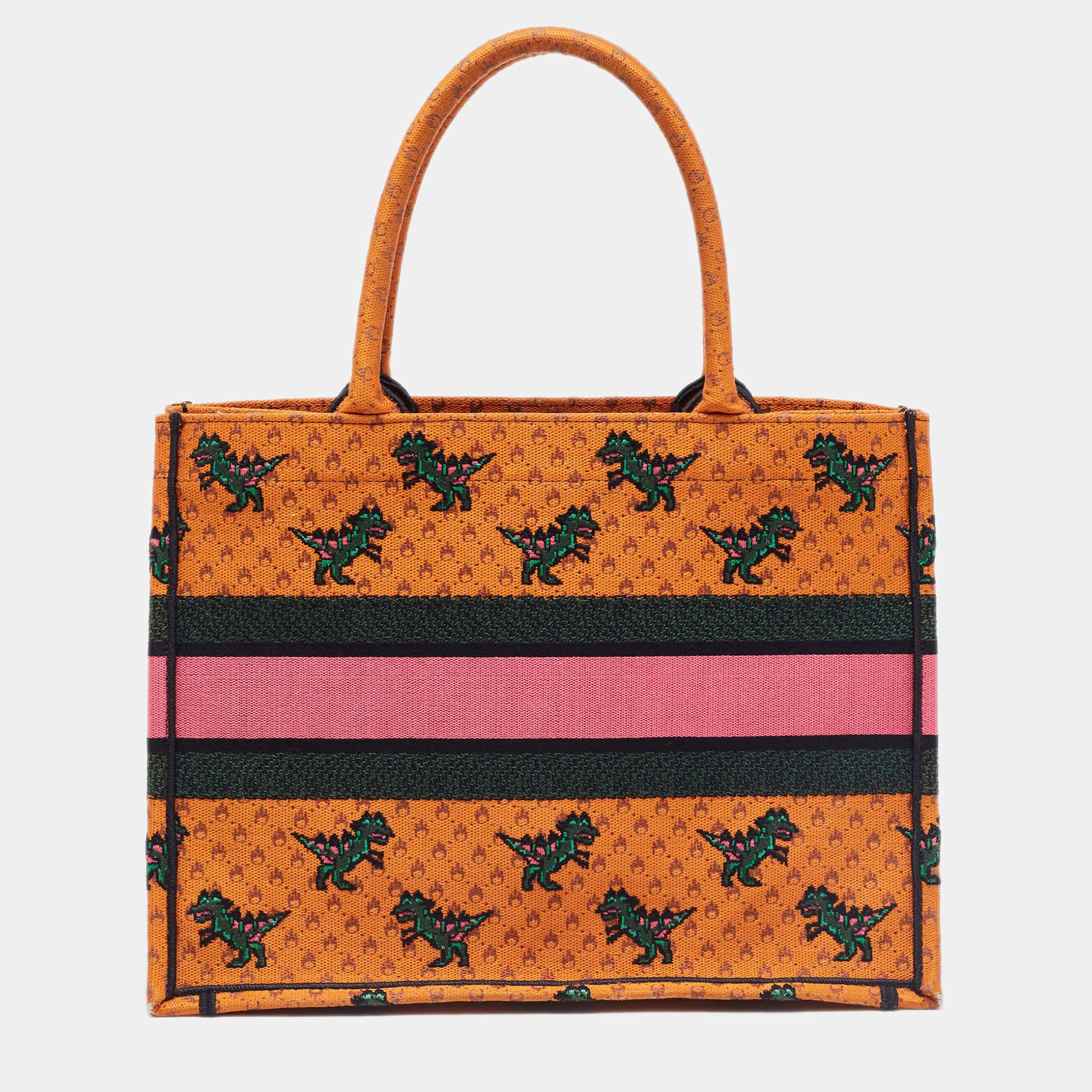 Designed by Maria Grazia Chiuri, the Dior Book Tote is a travel accessory for people with style. The bag here is crafted using canvas into a beautiful structure and is covered in embroidery. Two handles, the 'Christian Dior' signature, and a