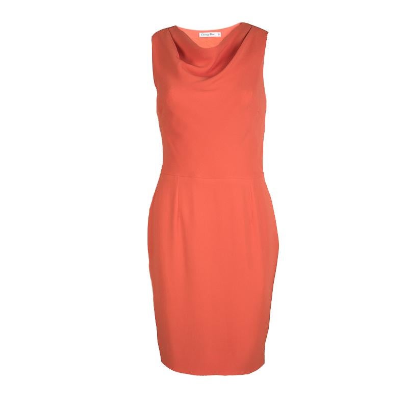 This pretty sleeveless dress is by Dior. Made from silk, the orange dress has a cowl neck and a slit at the back. A cute pair of ballet flats or strappy sandals will complement the dress beautifully on any day.

