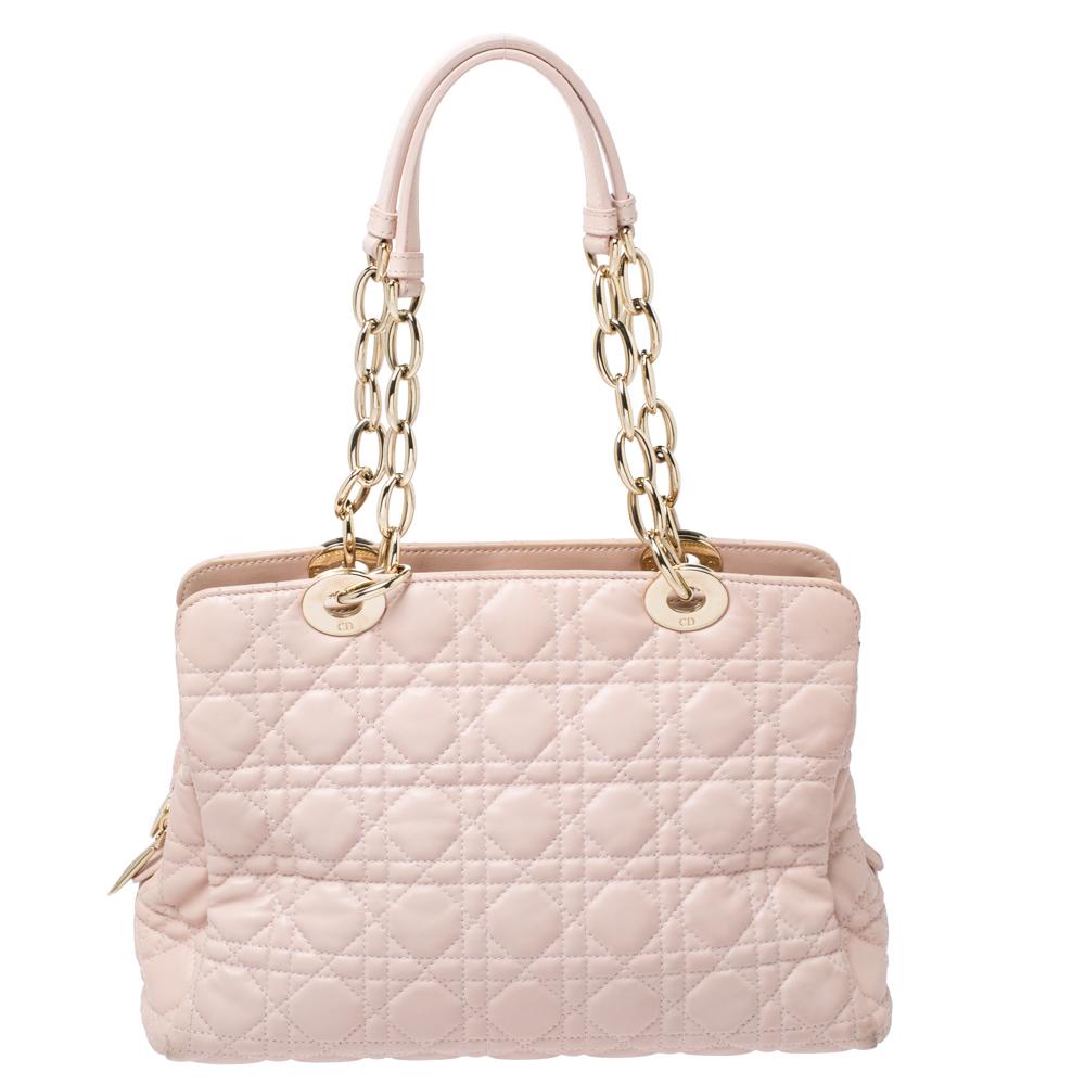 The Lady Dior tote is a Dior creation that has gained recognition worldwide and is today a coveted bag that every fashionista craves to possess. This pale pink tote has been crafted from leather and it carries the signature Cannage quilt. It is
